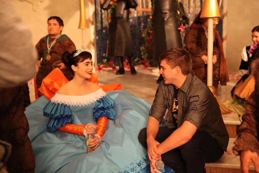 Paul Becker with Lily Collins on the set of Mirror Mirror